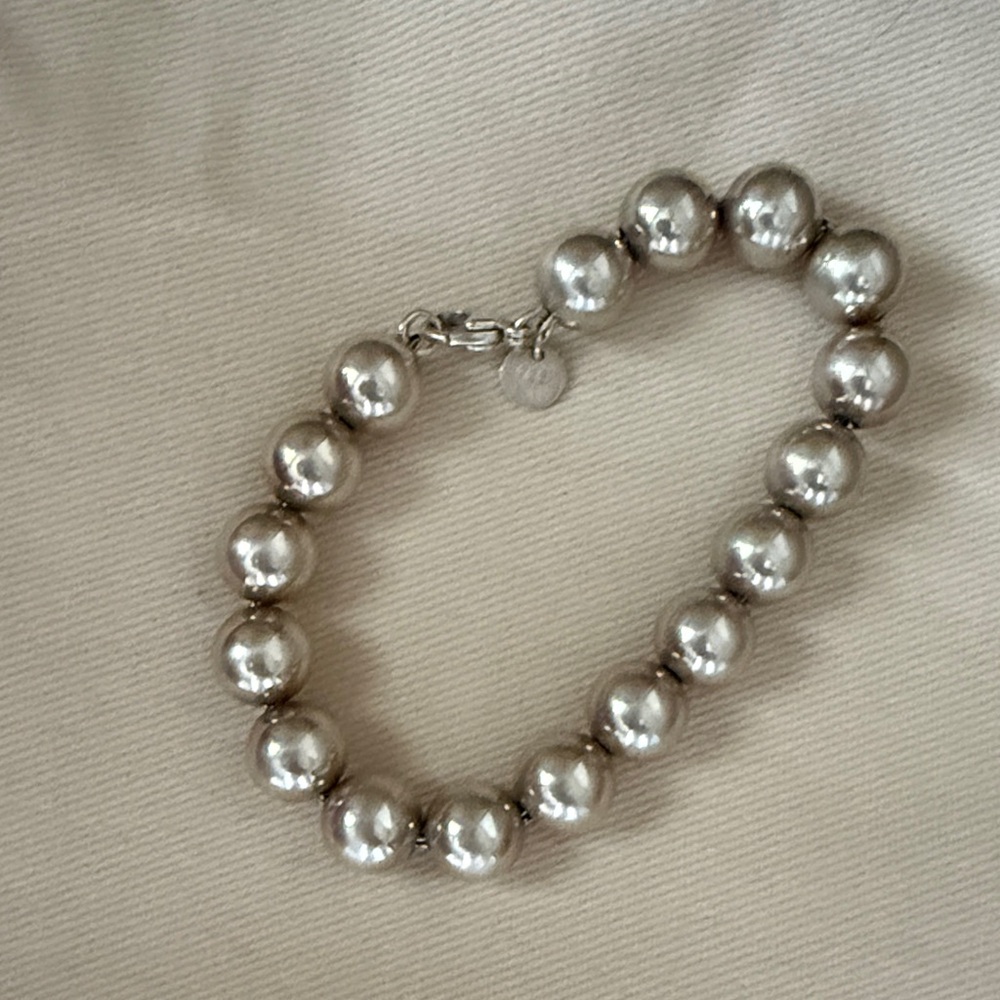 Authentic Tiffany silver bracelet. Box not included. Clasp closure.